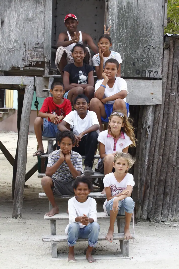 Students gathered on a wooden stairway