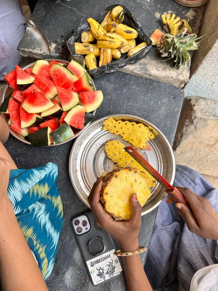 A plate of watermelon and corn shared on the trip