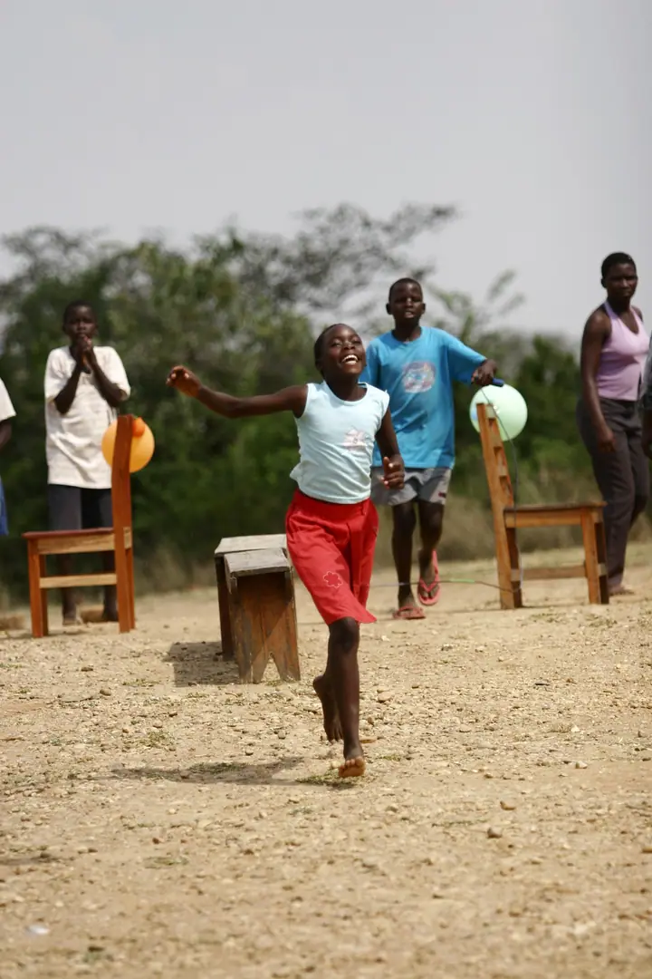 Students playing and dancing at camp